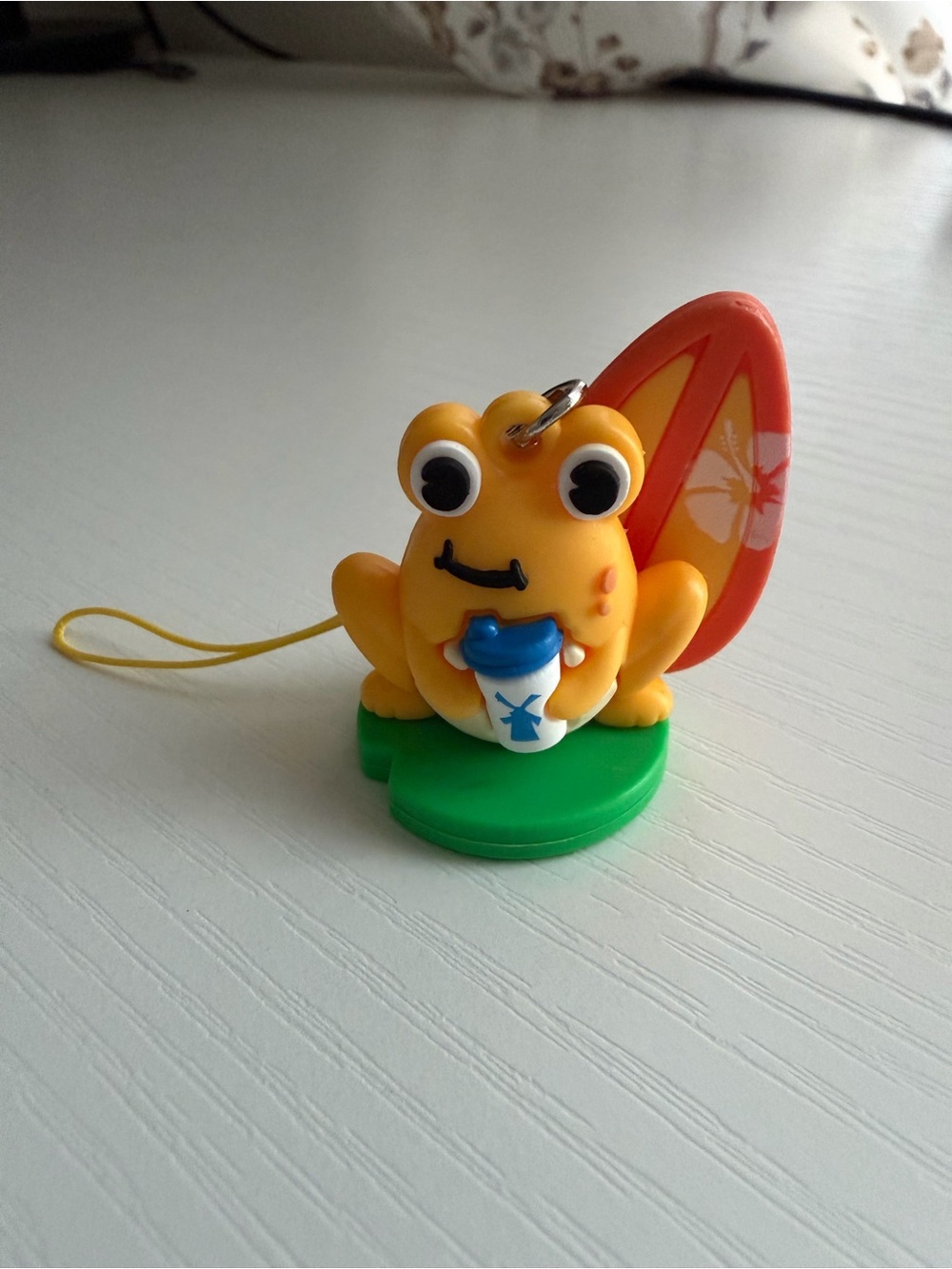 Dutch bros orange surfboard frog